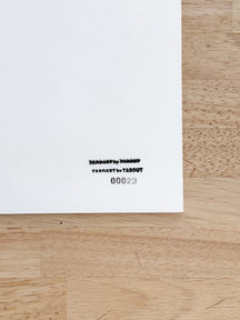 Back label of TAROART by TAROUT 00029 showing the serial number on the reverse side of the artwork