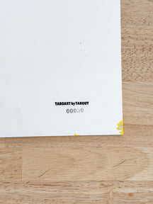 Back label of TAROART by TAROUT 00030 showing the serial number on the reverse side of the artwork