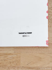 Back label of TAROART by TAROUT 00031 showing the serial number on the reverse side of the artwork