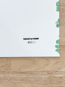 Back label of TAROART by TAROUT 00032 showing the serial number on the reverse side of the artwork