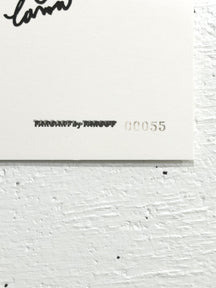 Close-up of the TAROUT signature and serial number 00055 on WHAT DO YOU COLLECT?, TAROART by TAROUT 00055