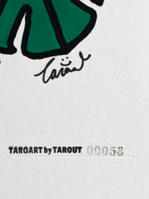 Close-up of the TAROUT signature and serial number 00058 on Little Monstera