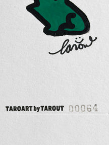 Close-up of the TAROUT signature and serial number 00064 on LUNNY and the Frog