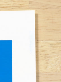 Close-up of a faint mark on the white edge of the illustration board in A Bunch of Us, TAROART by TAROUT 00074