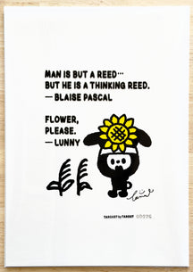 TAROART by TAROUT 00076, FLOWER, PLEASE.: LUNNY with a yellow flower on the head beside two reeds. Actual artwork photographed with its printed transparent sheet in place: “MAN IS BUT A REED... BUT HE IS A THINKING REED.” — Blaise Pascal; LUNNY replies “FLOWER, PLEASE.”.