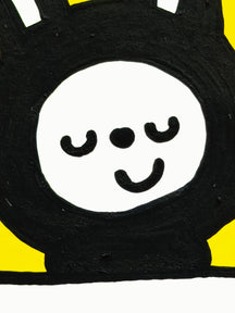 TAROART by TAROUT 00081, I KNOW.: close-up of LUNNY's closed eyes and smiling face against the yellow background.